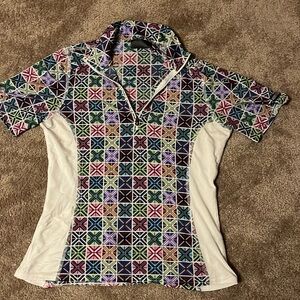colorfull KERRITS riding t-shirt size Small barely worn and in good condition.